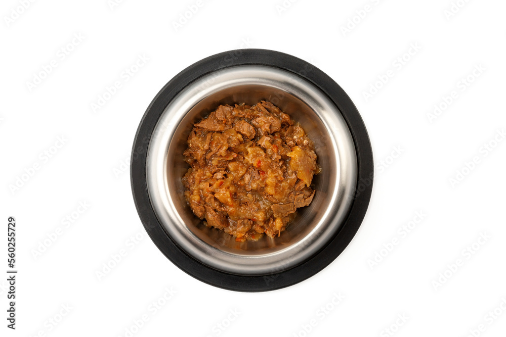 Wet food for cats and dogs in a bowl on a white background. Top view. Wet food for cats and dogs in a bowl on a white background. Top view.
