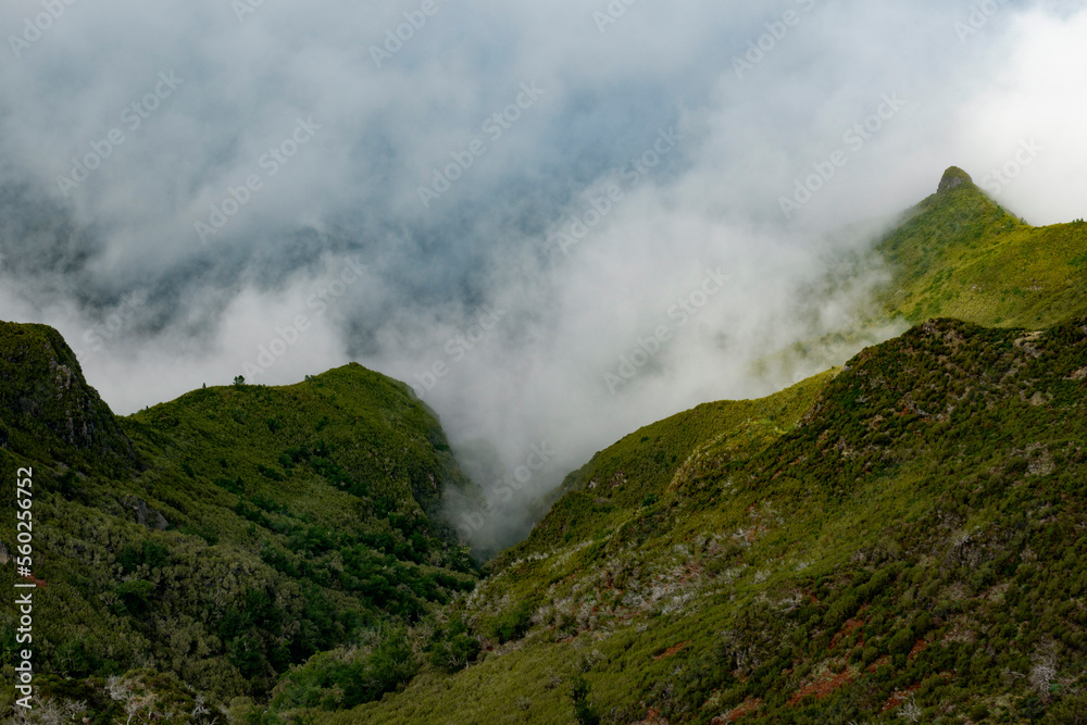 Landscapes with fog between mountains on the route of Pico Ruivo in Madeira Portugal Landscapes with fog between mountains on the route of Pico Ruivo in Madeira Portugal