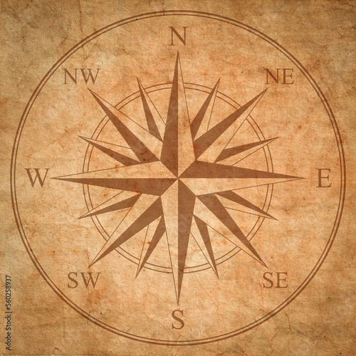 Foto Wind rose on old brown grunge paper