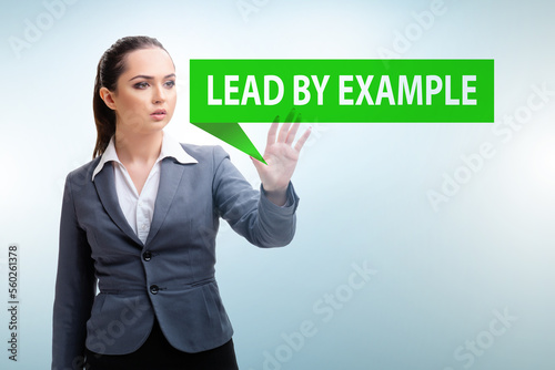 Businesswoman in lead by example concept