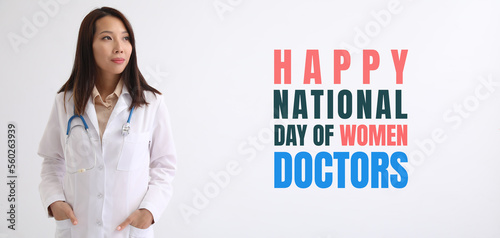 Asian doctor on light background. National Day of Women Doctors photo