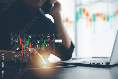 Stock business finance technology and investment concept. Stock Market Investments Funds and Digital Assets. Businesswoman analysing forex trading graph financial data. Business finance background.