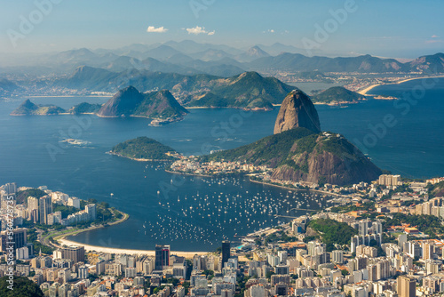 View from Christ the Redeemer to Botafogo Beach and the Sugarloaf Mountain in Rio de Janeiro, Brazil photo