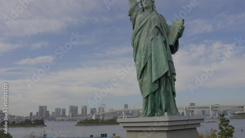 This video shows a replica of the statue of liberty in Tokyo Japan. photo