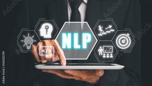 NLP natural language processing cognitive computing technology concept, Business person using digital tablet with VR screen NLP icon, AI Artificial intelligence. photo