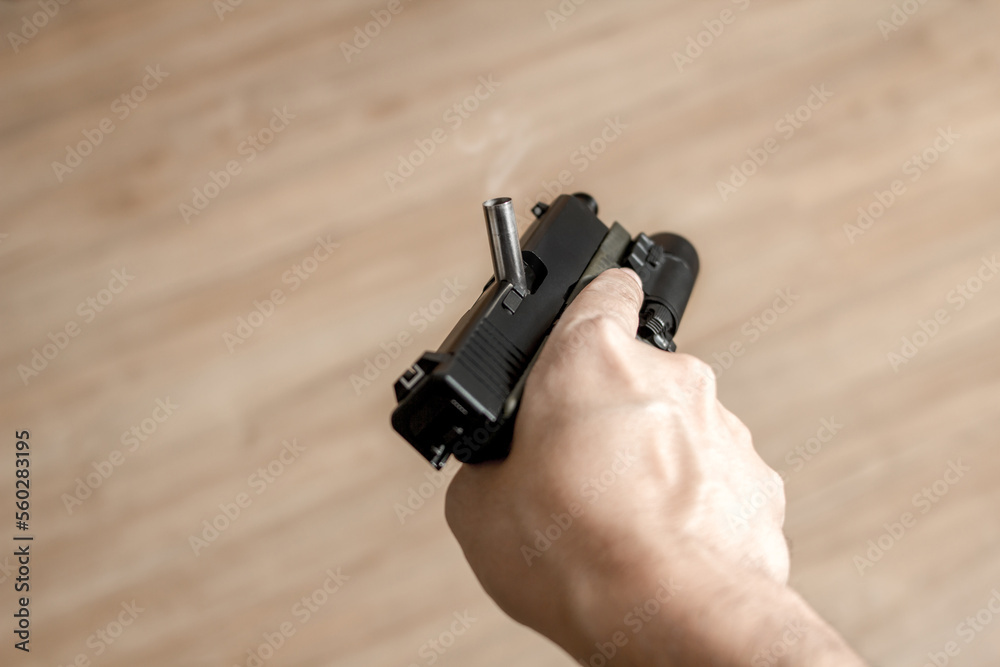 Bullet pistol gun malfunctions. Closeup detail view of pistol, handgun