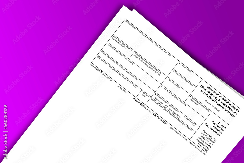 Obraz premium Form 8288-A documentation published IRS USA 04.18.2018. American tax document on colored