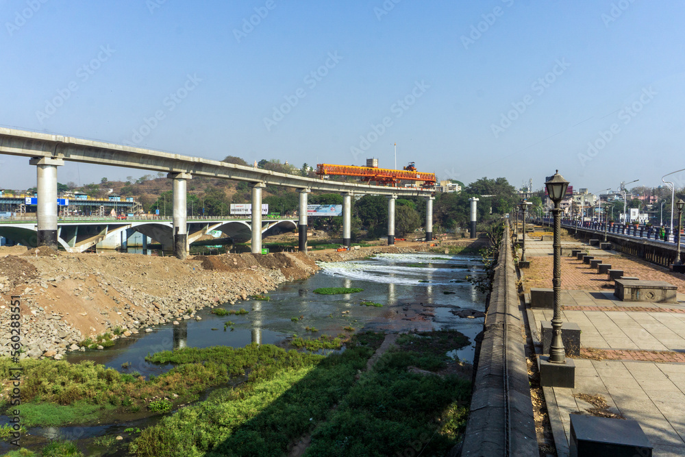Construction of bridge across Mula-Mutha river in Pune city for Metro Rail project, India.