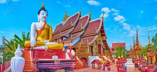 Panorama of Wat Ratcha Monthian with Buddha Image and viharn, Chiang Mai, Thailand photo