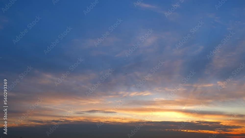 Stunning fast time lapse motion video of beautiful colorful clouds, Majestic sunrise sky landscape. cloudscape time-lapse. loop of sky. nature background. Movement of nature concept. 4K
Stunning fast time lapse motion video of beautiful colorful clouds, Majestic sunrise sky landscape. cloudscape time-lapse. loop of sky. nature background. Movement of nature concept. 4K