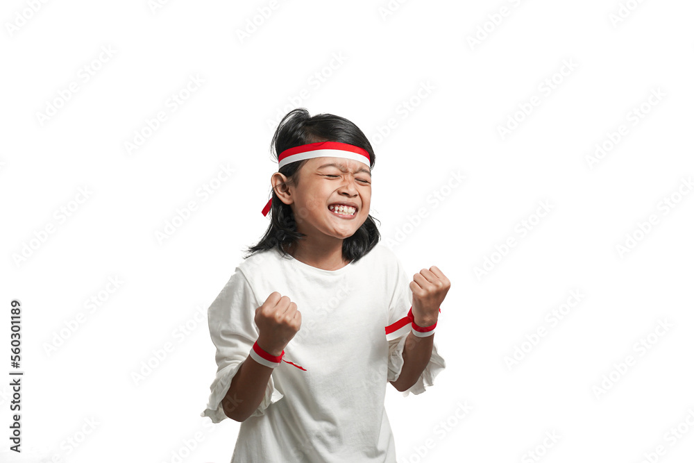 Smiling happy asian girl with indonesian independence concept, holding victory hand gesture. Isolated by white background. Smiling happy asian girl with indonesian independence concept, holding victory hand gesture. Isolated by white background.