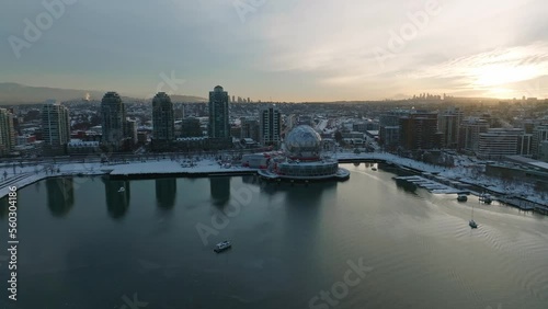 Vancouver Science World ASTC building covered in winter snow - Drone Aerial Sunset Shot photo