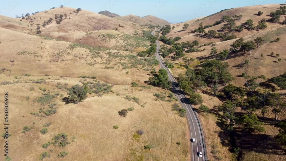 Aerial drone scenic landscape beautiful views of car on highway bushland farms trees mountains Flinders Ranges tourism travel Adelaide South Australia 4K Aerial drone scenic landscape beautiful views of car on highway bushland farms trees mountains Flinders Ranges tourism travel Adelaide South Australia 4K