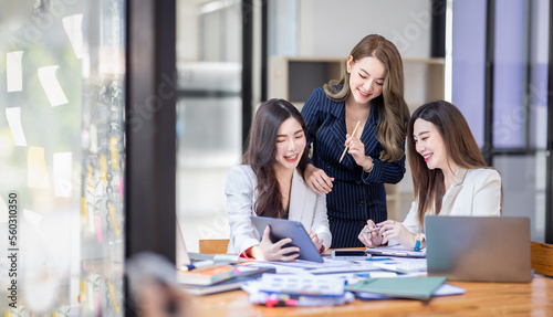 Group of Young excited Asian business team creative business people coworker in office Happy to be successful partnership teamwork celebrating achievement and success concept.