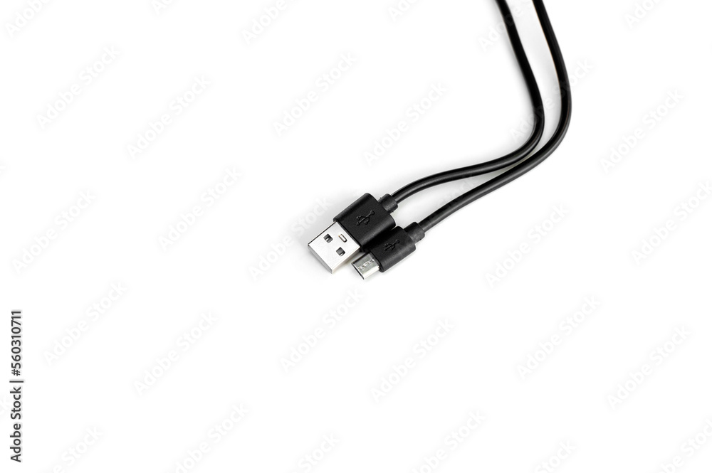 Black USB cable isolated on black background. Black USB cable isolated on black background.