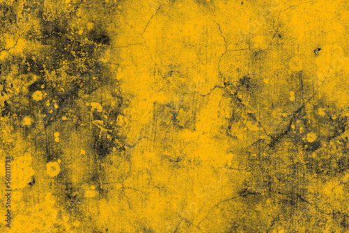 Damaged old yellow concrete wall with dark grunge texture