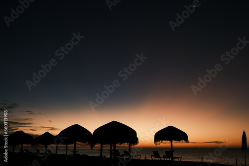 Huts on the beach with dawn sky