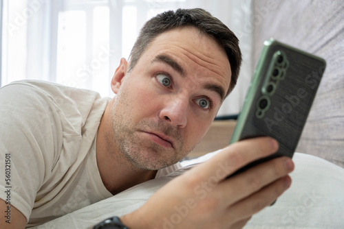 фотографія Wake up shocked guy late for work in morning
