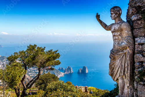 View of the sea and the statue of the august emperor, from the heights of Mount Solaro, Anacapri, Capri Island, Naples area, Italy photo