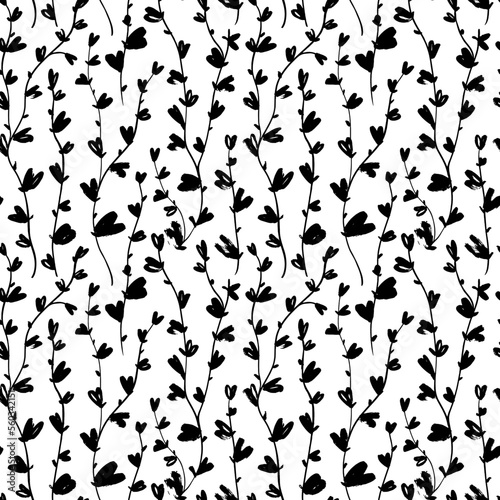 Curved thin branches with small leaves seamless pattern. Heart shape leaves on vertical liana stems. Botanical stylish background with brush drawn vector plants. Hand drawn foliage black silhouettes.