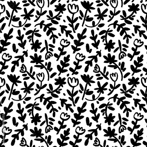 Childish floral pattern in small black flowers on stems. Ditsy print, spring botanical seamless pattern. Brush drawn vector wild flowers. Hand drawn sketch chamomiles and branches with leaves.