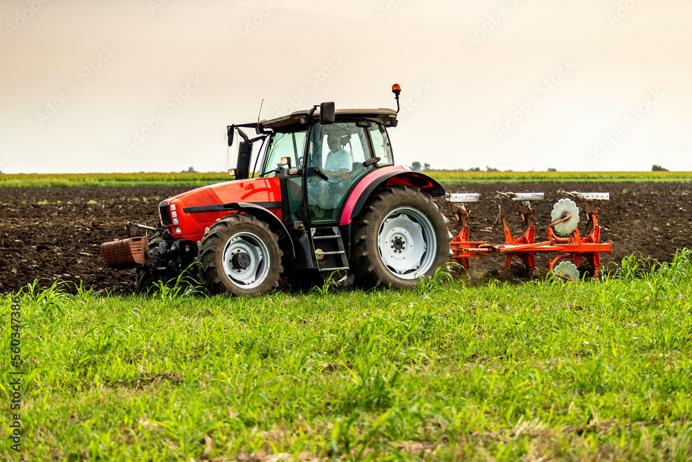Scientific land preparation with tractor plowing and cultivating of stubble field for crops Scientific land preparation with tractor plowing and cultivating of stubble field for crops