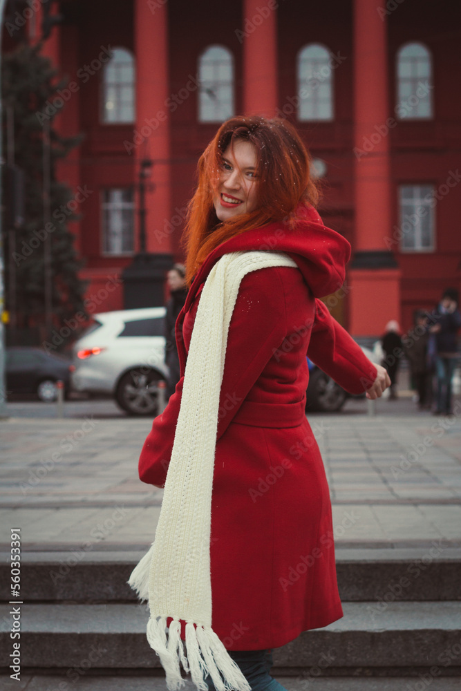 Fototapeta premium Close up attractive woman with white scarf on street portrait picture. Closeup side view photography with cityscape on background. High quality photo for ads, travel blog, magazine, article