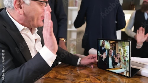 businessman having a video call with other colleagues.