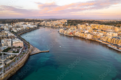 Marsaskala fisherman village in Malta, aerial drone view