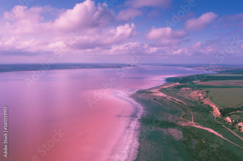 Landscape with Pink lake and cloudy sky. Panoramic view from above at Pink lake