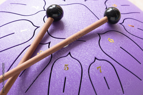 Tongue drum, Purple hang drum. close-up. photo