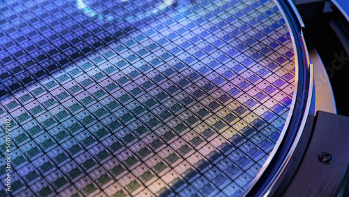 Photography Macro Shot of Computer Chips on Silicon Wafer during Semiconductor Manufacturing at Fab or Foundry