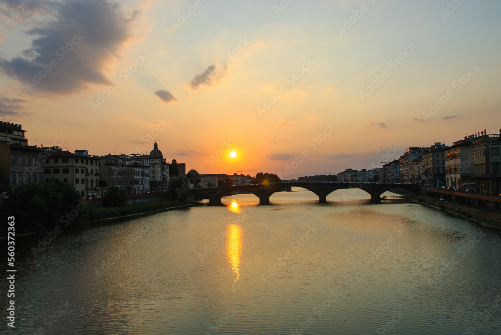 Sunset on river Arno and ponte Santa Trinita