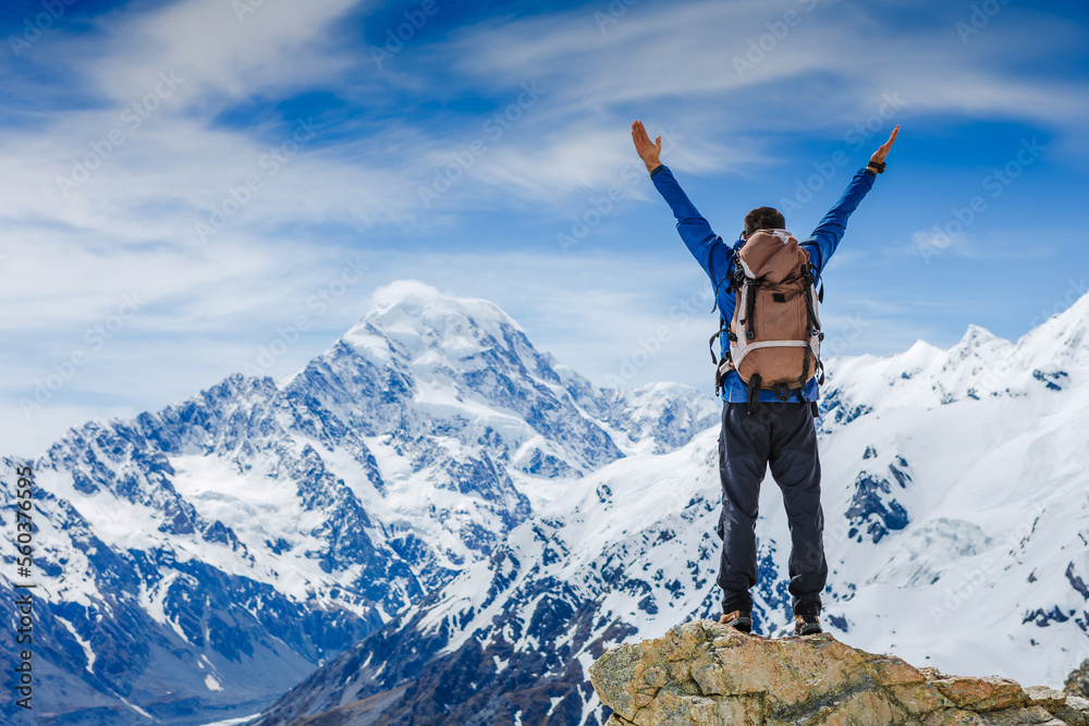 Man hiking with heavy backpack. Alone into the wild