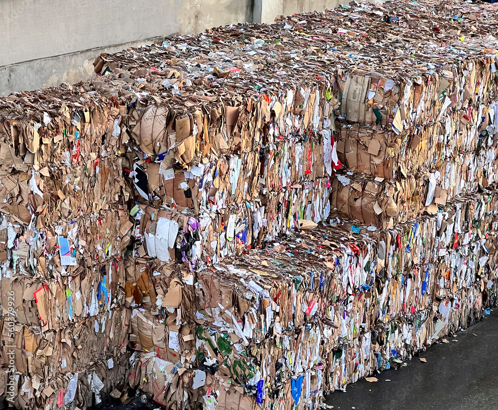 Paper and cardboard recycle. Cardboard and box pile outdoors. Reuse