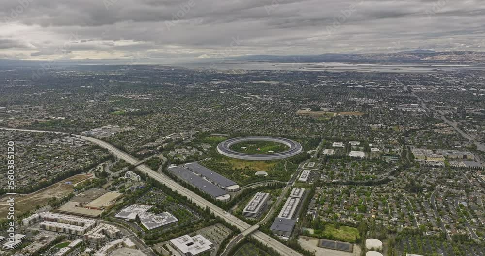 Cupertino California Aerial v6 high angle view drone fly around global tech giant apple park campus capturing junipero serra freeway and surrounding neighborhoods - Shot with Mavic 3 Cine - June 2022