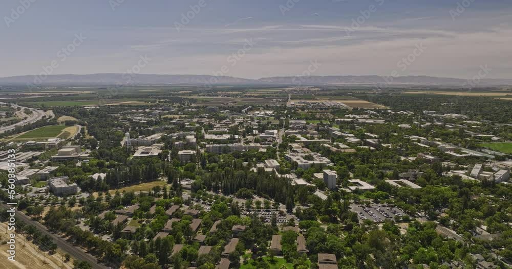 Davis California Aerial v2 reverse flyover uc davis university campus area capturing the above view of the whole college town environment at daytime in summer - Shot with Mavic 3 Cine - June 2022 Davis California Aerial v2 reverse flyover uc davis university campus area capturing the above view of the whole college town environment at daytime in summer - Shot with Mavic 3 Cine - June 2022