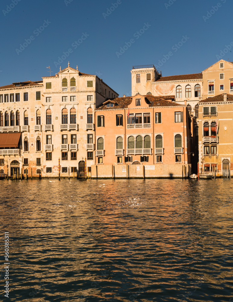 Colorful architectural details and gothic Venetian Architecture in Venice, Italy by a canal