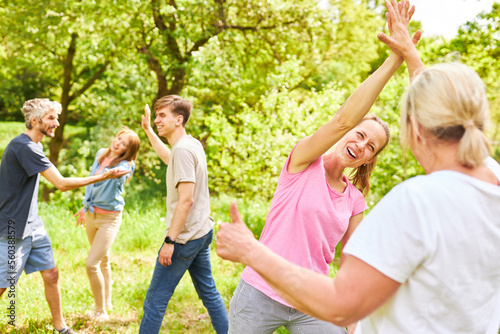 Group of young people rejoices in a success