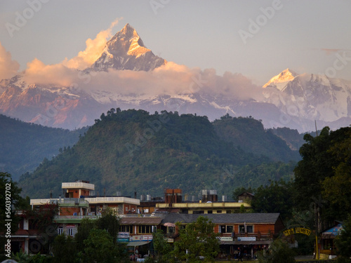 Machhapuchhare peak rising above Pokhara, Nepal. photo