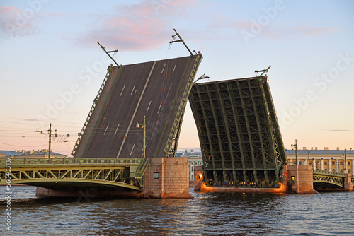 Divorced Palace Bridge over Neva at dawn with pink clouds in sky, St. Petersburg