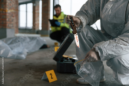 фотографія Putting the knife into bag