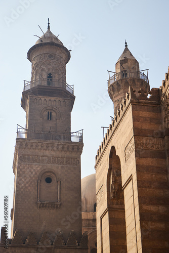 Cairo, Egypt- June 26 2020: Moez Street with few local visitors and Sabil-Kuttab of Katkhuda Mamluk era historic building at the far end during Covid-19 lockdown period, Gamalia district, Old Cairo photo