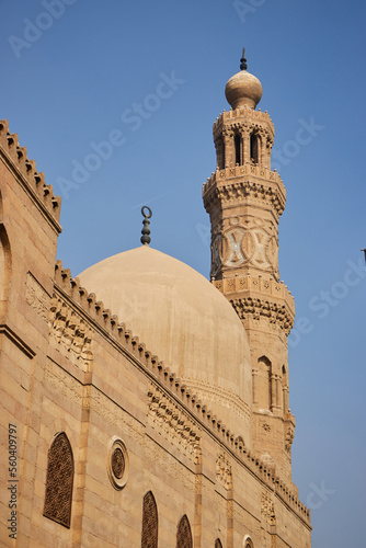 Cairo, Egypt- June 26 2020: Moez Street with few local visitors and Sabil-Kuttab of Katkhuda Mamluk era historic building at the far end during Covid-19 lockdown period, Gamalia district, Old Cairo photo