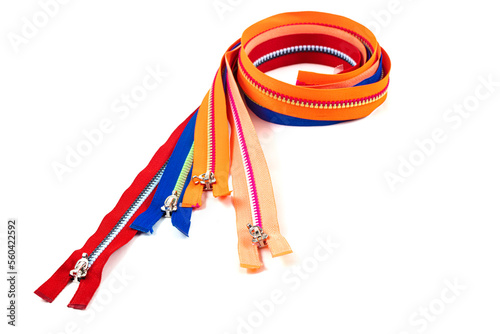 Assorted YKK Nylon Zippers. The Hottest Colors of The Season-Great for Sewing Craft Projects. Bright zipper of different colors and variants in the textile industry. photo