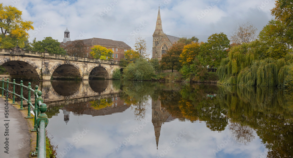 Naklejka premium The English Bridge across the River Severn with United Reformed Church to the right hand side, Shrewsbury, Shropshire, England