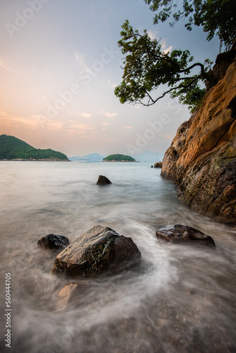 rocks and sea at coast © TszHo
