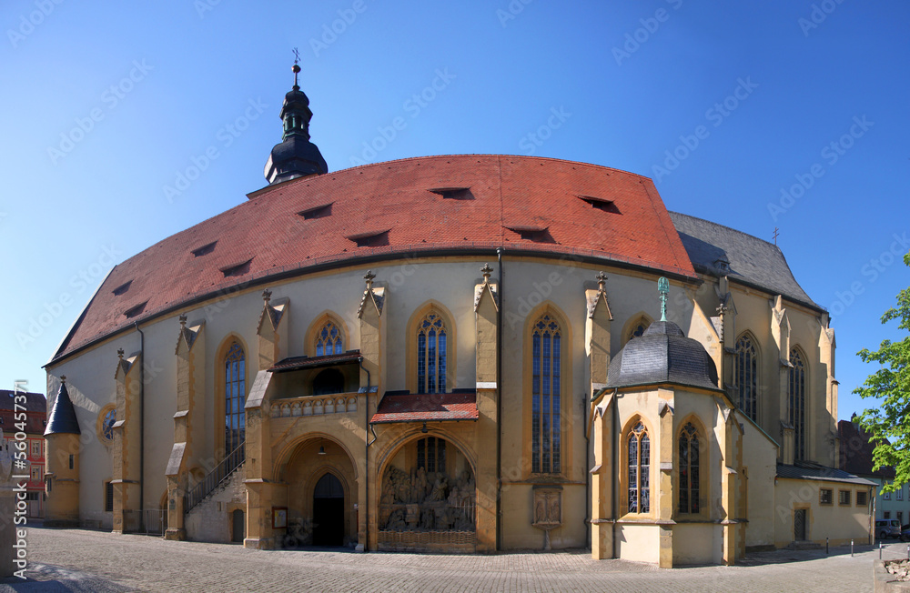 Panoramic view of the medieval city church of St John with its nave in the old town of Kitzingen, Germany