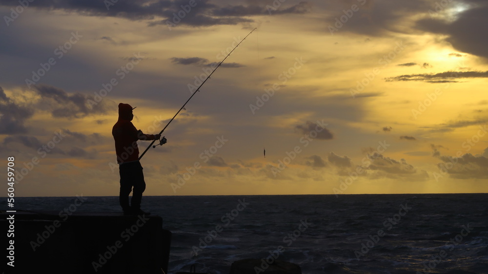 fishing at beautiful sunset