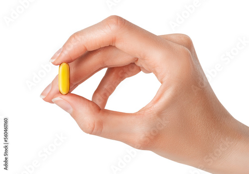 Doctor hand holding Omega 3 capsule isolated on white or transparent background. Fish oil dietary supplement.
